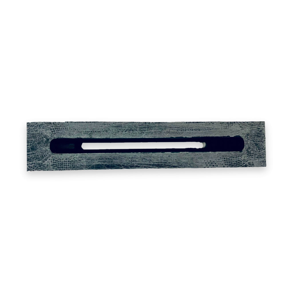 Adjustable Tuttle Box V4 held in hand, view of mast slot